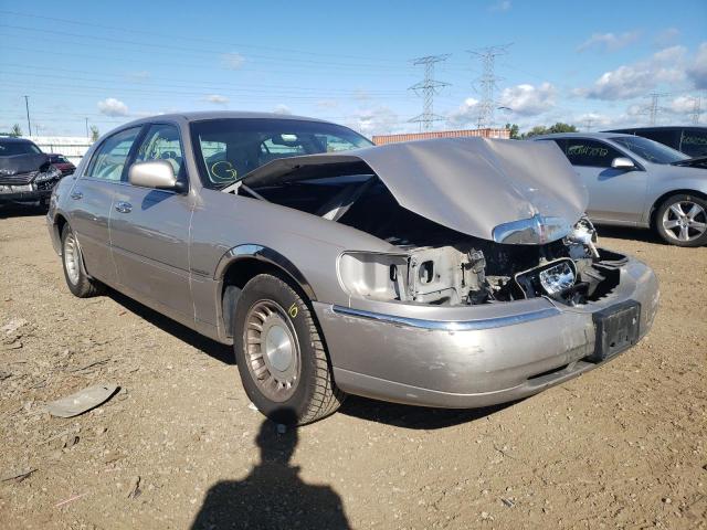 LINCOLN TOWN CAR E 2000 with VIN 1LNHM81WXYY792319 - Photo from auction