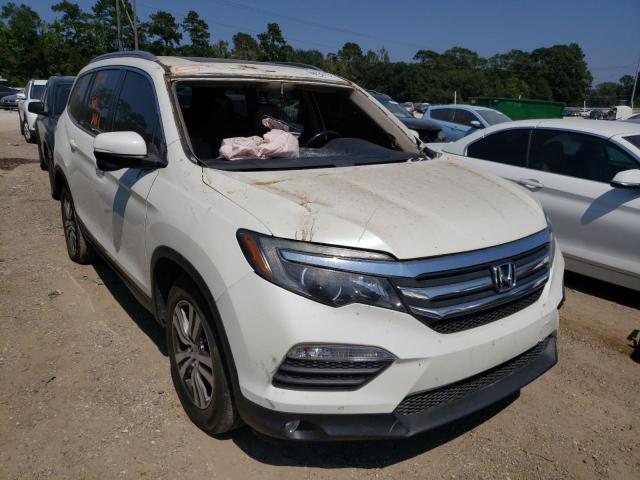 HONDA PILOT EXLN 2016 with VIN 5FNYF5H70GB023564 - Photo from auction