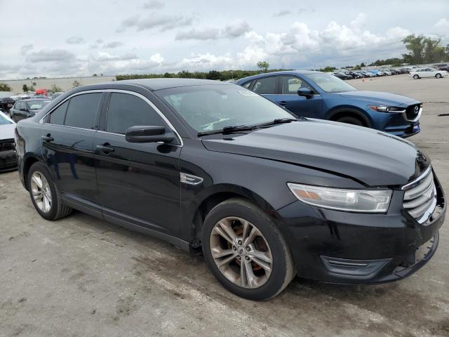 FORD TAURUS SEL 2013 with VIN 1FAHP2H8XDG234122 - Photo from auction