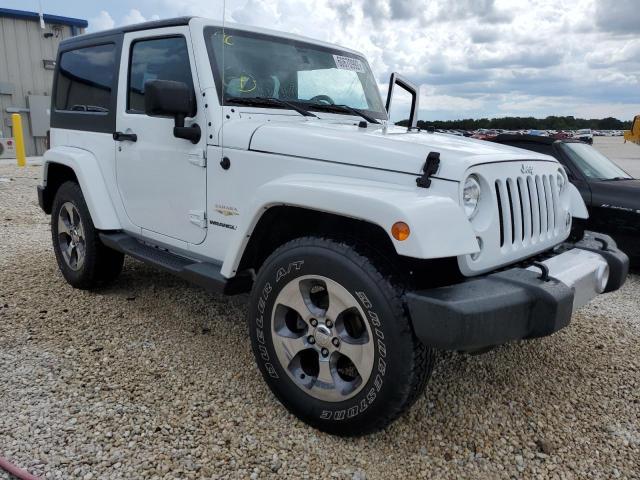 JEEP WRANGLER S 2015 with VIN 1C4AJWBG0FL655698 - Photo from auction