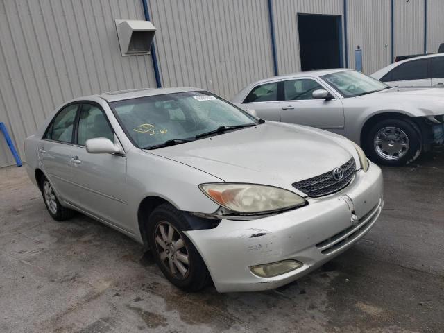 Photo 1 from auction – 2004 TOYOTA CAMRY LE with VIN 4T1BF30K74U569450