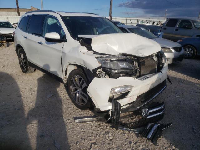 HONDA PILOT ELIT 2017 with VIN 5FNYF6H02HB050095 - Photo from auction
