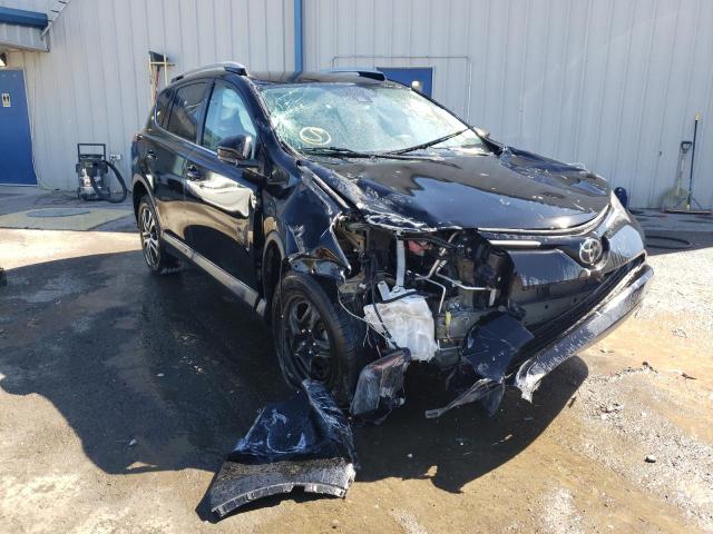 TOYOTA RAV4 LE 2018 with VIN 2T3ZFREV8JW442214 - Photo from auction