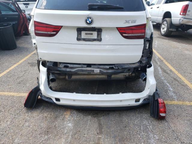 Photo 9 from auction – 2015 BMW X5 XDRIVE3 with VIN 5UXKR0C5XF0P14232