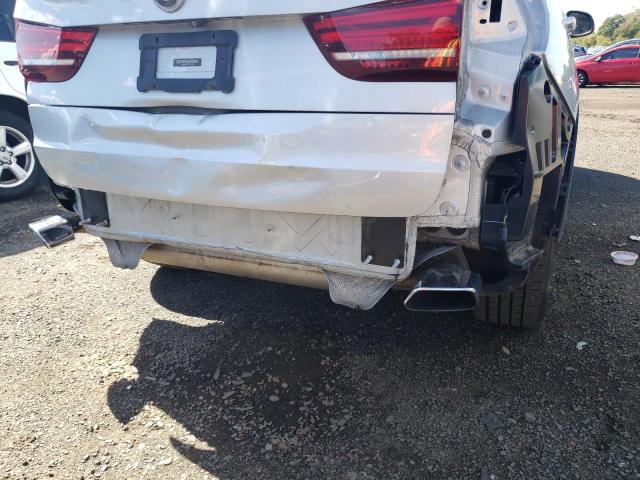 Photo 9 from auction – 2014 BMW X5 XDRIVE5 with VIN 5UXKR6C57E0J73190
