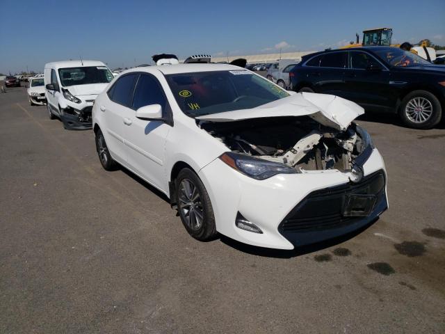 TOYOTA COROLLA L 2018 with VIN 2T1BURHE6JC980696 - Photo from auction