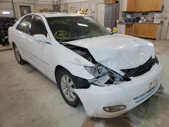 TOYOTA CAMRY LE 2003 with VIN 4T1BE30K33U257840 - Photo from auction