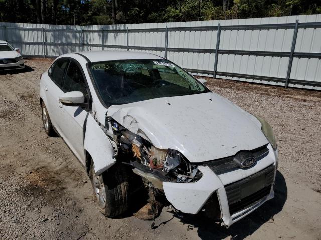 FORD FOCUS SE 2014 with VIN 1FADP3F28EL336269 - Photo from auction