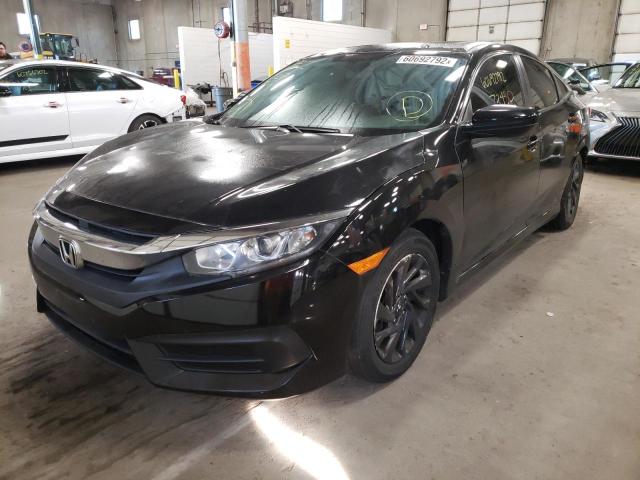 Photo 2 from auction – 2018 HONDA CIVIC EX with VIN 19XFC2F77JE031241