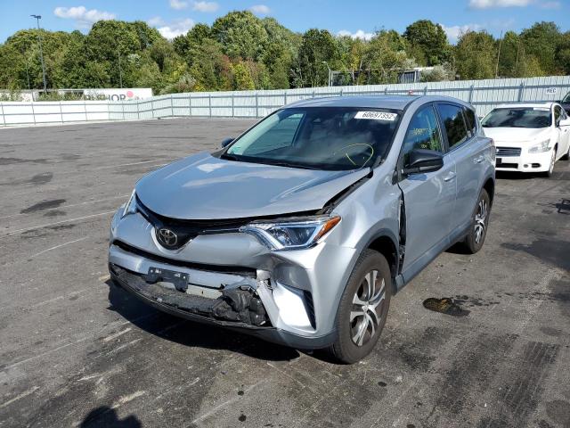 Photo 2 from auction – 2018 TOYOTA RAV4 LE with VIN 2T3BFREV1JW721716
