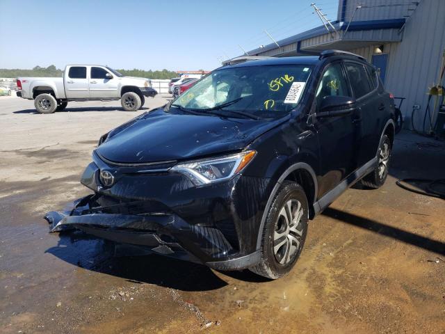 Photo 2 from auction – 2018 TOYOTA RAV4 LE with VIN 2T3ZFREV8JW442214