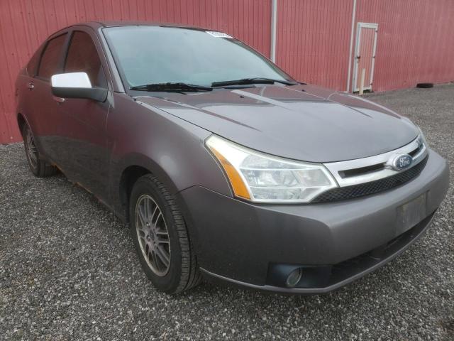 FORD FOCUS SE 2011 with VIN 1FAHP3FNXBW123328 - Photo from auction