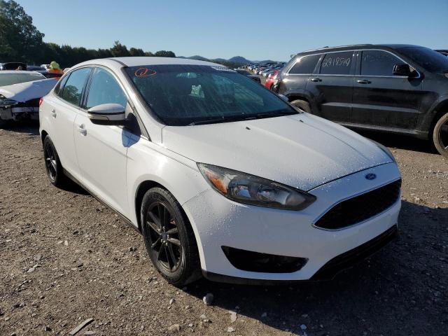 FORD FOCUS 2015 with VIN 1FADP3FE4FL291827 - Photo from auction