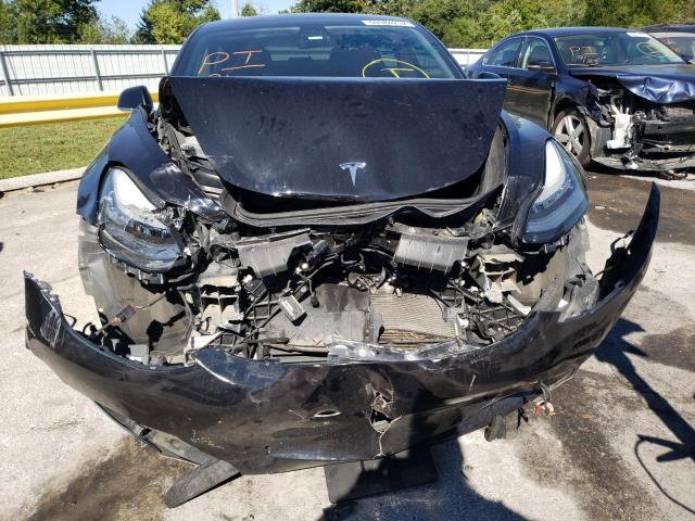 Photo 9 from auction – 2018 TESLA MODEL 3 with VIN 5YJ3E1EB8JF095019