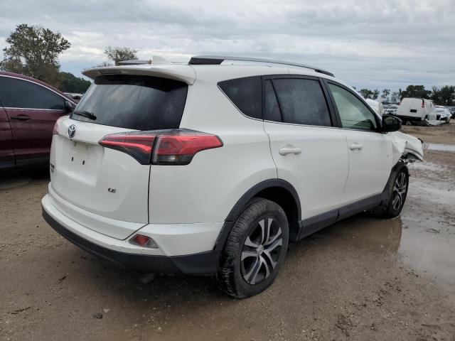 Photo 4 from auction – 2017 TOYOTA RAV4 LE with VIN JTMZFREV0HJ139372