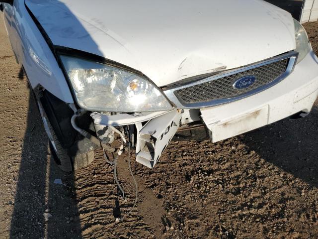 Photo 9 from auction – 2007 FORD FOCUS ZX4 with VIN 1FAFP34N97W148738