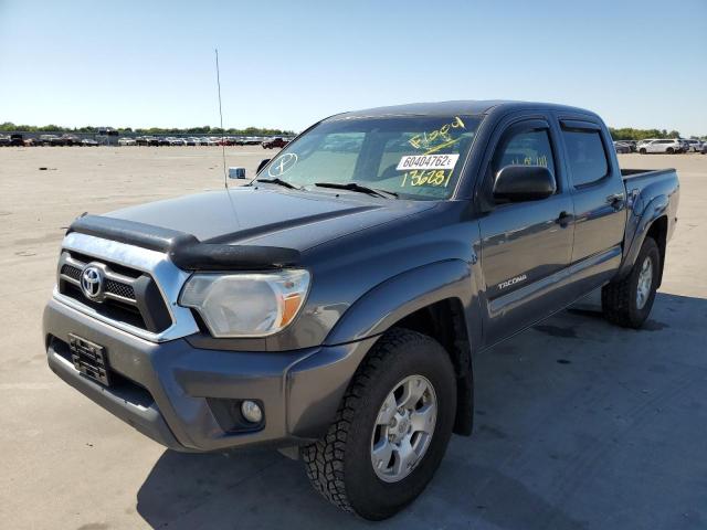 Photo 2 from auction – 2014 TOYOTA TACOMA DOU with VIN 3TMLU4EN8EM136281