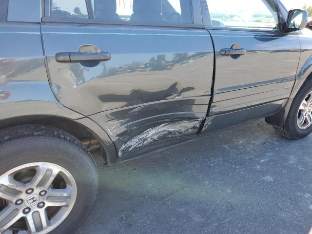 Photo 9 from auction – 2004 HONDA PILOT with VIN 2HKYF18674H548649