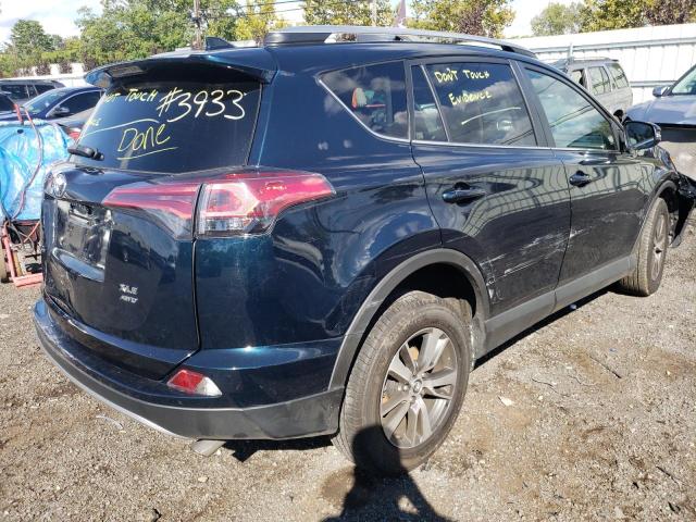 Photo 4 from auction – 2018 TOYOTA RAV4 ADVEN with VIN 2T3RFREVXJW830450