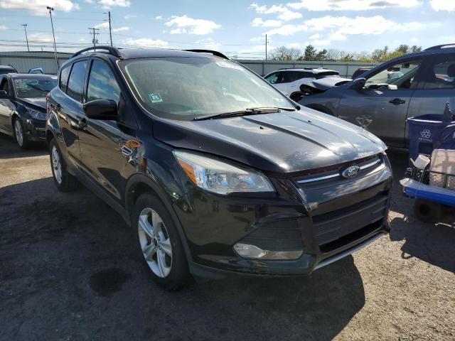 FORD ESCAPE SE 2014 with VIN 1FMCU9GXXEUA86258 - Photo from auction