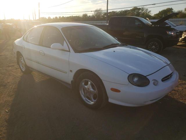 FORD TAURUS SE 1999 with VIN 1FAFP53S7XA316201 - Photo from auction