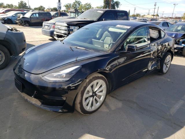 TESLA MODEL 3 2022 with VIN 5YJ3E1EA4NF143452 - Photo from auction