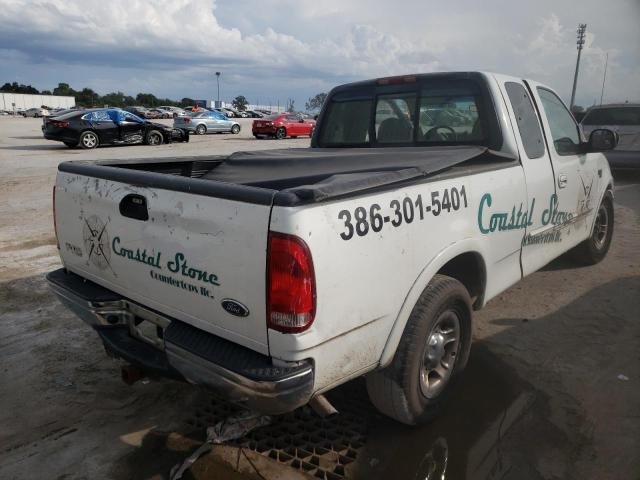 Photo 4 from auction – 2000 FORD F150 with VIN 1FTRX17L8YNC35351