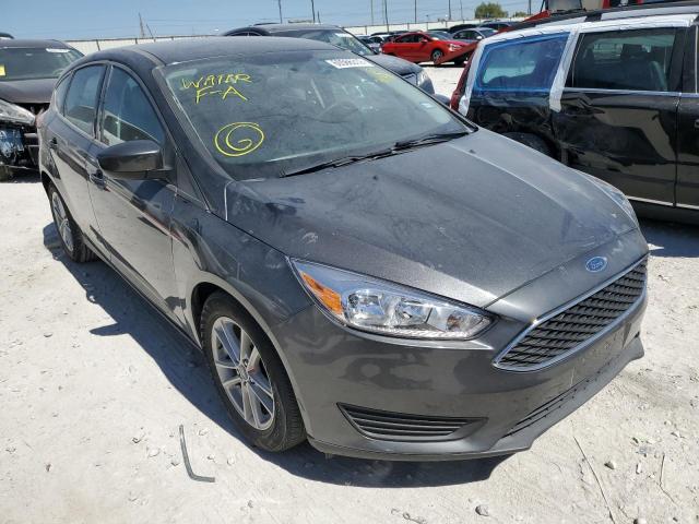 FORD FOCUS SE 2018 with VIN 1FADP3K20JL307378 - Photo from auction