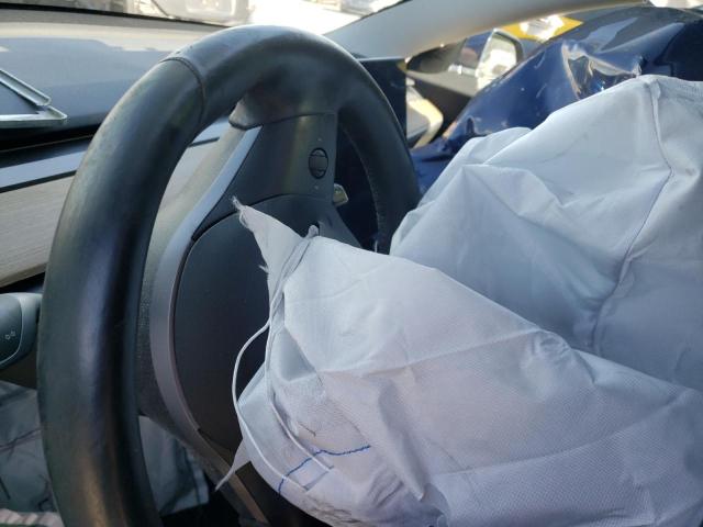 Photo 8 from auction – 2018 TESLA MODEL 3 with VIN 5YJ3E1EA7JF005558