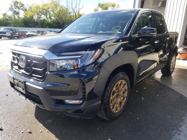 Photo 2 from auction – 2022 HONDA RIDGELINE with VIN 5FPYK3F73NB002683
