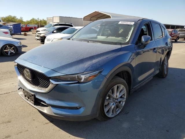 Photo 2 from auction – 2021 MAZDA CX-5 GRAND with VIN JM3KFBDM1M0340433
