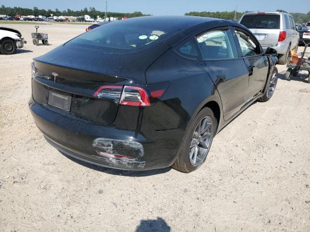 Photo 4 from auction – 2021 TESLA MODEL 3 with VIN 5YJ3E1EA3MF093979