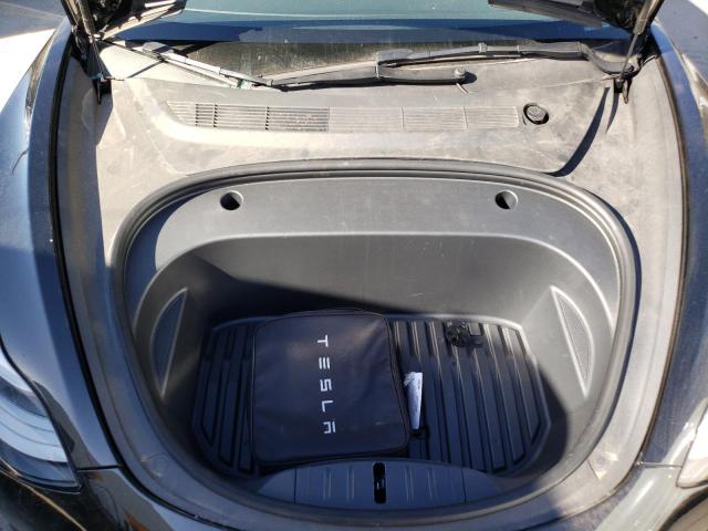 Photo 11 from auction – 2022 TESLA MODEL 3 with VIN 5YJ3E1EA4NF143452