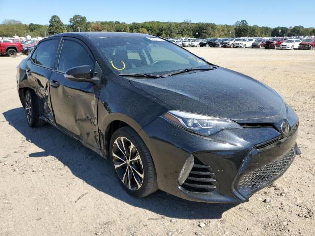 TOYOTA COROLLA L 2017 with VIN 5YFBURHE3HP662285 - Photo from auction