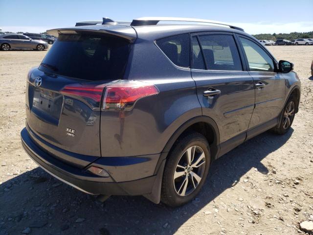 Photo 4 from auction – 2018 TOYOTA RAV4 ADVEN with VIN JTMRFREV0JD229481