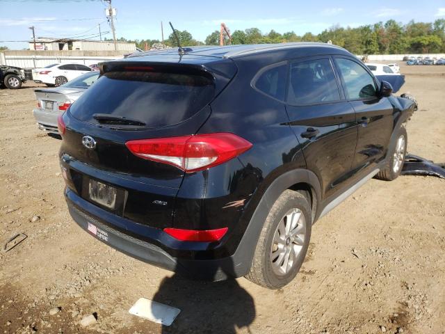 Photo 4 from auction – 2017 HYUNDAI TUCSON LIM with VIN KM8J3CA49HU535116