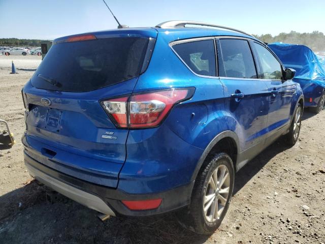 Photo 4 from auction – 2018 FORD ESCAPE SE with VIN 1FMCU9GD4JUD14254