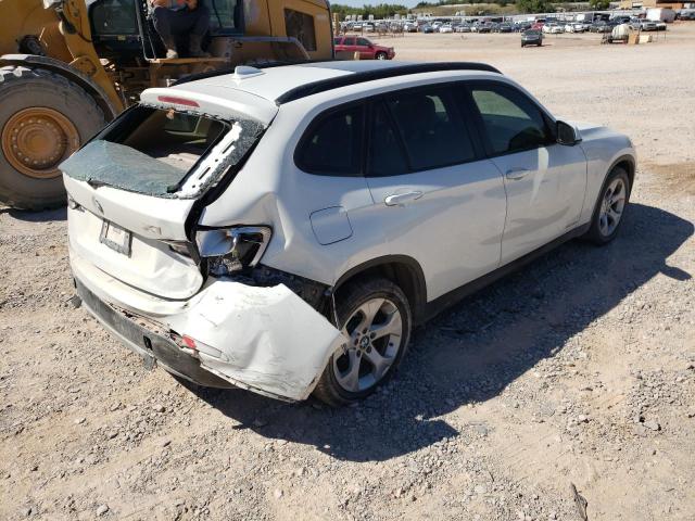 Photo 4 from auction – 2014 BMW X1 SDRIVE2 with VIN WBAVM1C54EVW51064