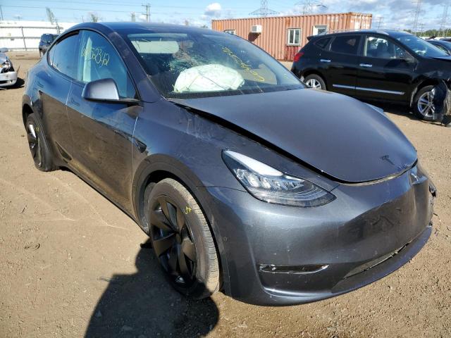 TESLA MODEL Y 2022 with VIN 7SAYGDEE1NF308994 - Photo from auction