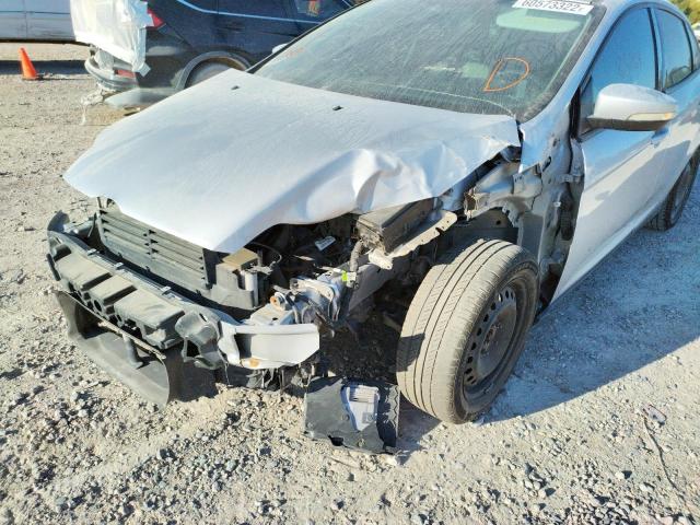 Photo 9 from auction – 2014 FORD FOCUS SE with VIN 1FADP3F29EL351475