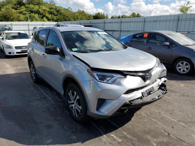 TOYOTA RAV4 LE 2018 with VIN 2T3BFREV1JW721716 - Photo from auction