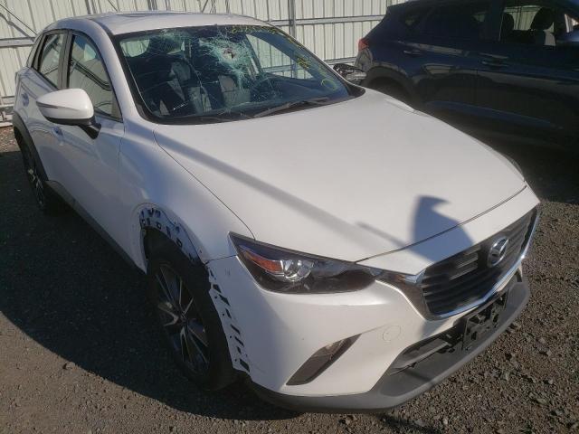 MAZDA CX-3 TOURI 2018 with VIN JM1DKFC7XJ1303774 - Photo from auction