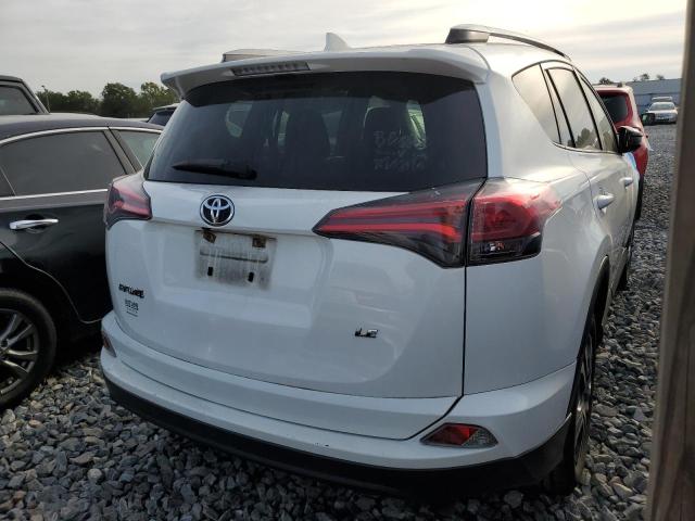 Photo 4 from auction – 2017 TOYOTA RAV4 LE with VIN JTMZFREV3HJ141682