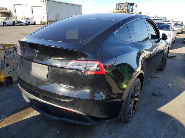 Photo 4 from auction – 2021 TESLA MODEL Y with VIN 5YJYGAEE2MF151051