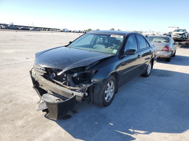 Photo 2 from auction – 2002 TOYOTA CAMRY LE with VIN JTDBE32K020050068