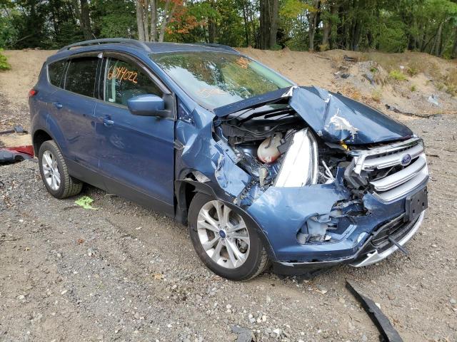 FORD ESCAPE SE 2018 with VIN 1FMCU9GD7JUA76934 - Photo from auction