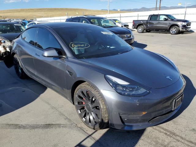 TESLA MODEL 3 2021 with VIN 5YJ3E1EC2MF975565 - Photo from auction