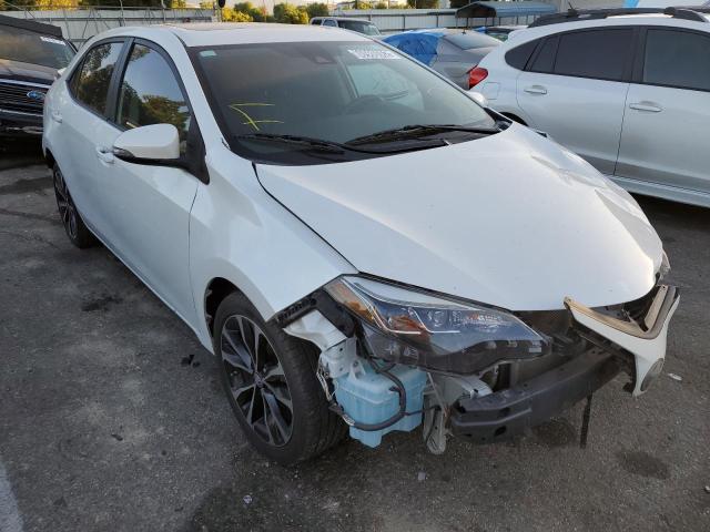 TOYOTA COROLLA L 2017 with VIN 5YFBURHE2HP603597 - Photo from auction