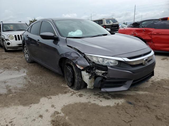 HONDA CIVIC LX 2017 with VIN 19XFC2F57HE057654 - Photo from auction
