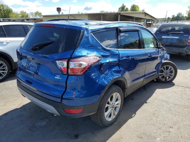 Photo 4 from auction – 2017 FORD ESCAPE SE with VIN 1FMCU9GD3HUD99131